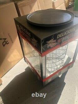 Gold Medal pizza warmer. Holds 4 18 inch pizzas. Comes with four pans