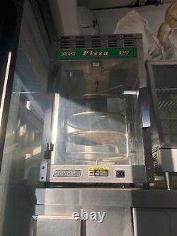 Pizza warmer made by roundup rotating glass