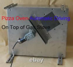 Portable pizza oven on top of gas stove